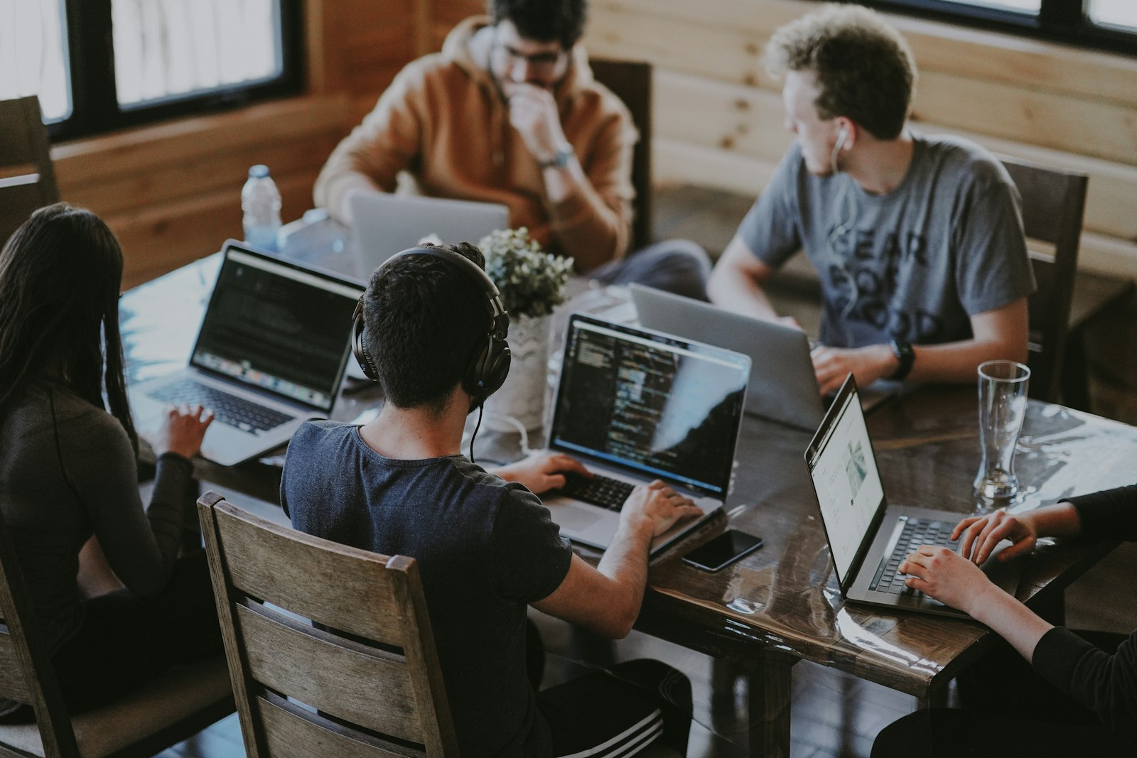 The 1 Business Funding team collaborating in the office